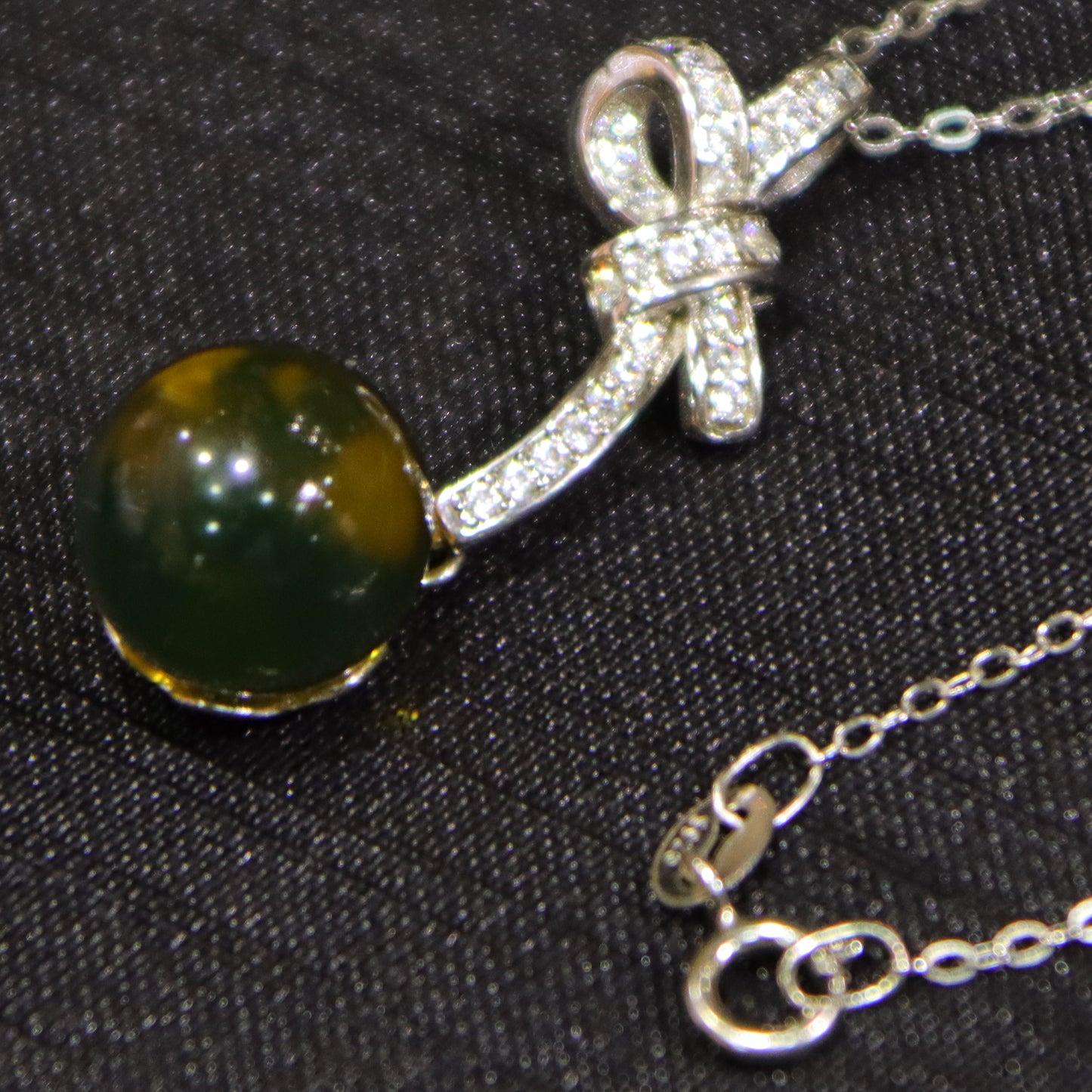 925 Sterling Silver Natural Mexico Blue Amber Bow Pendant with 10mm Bead