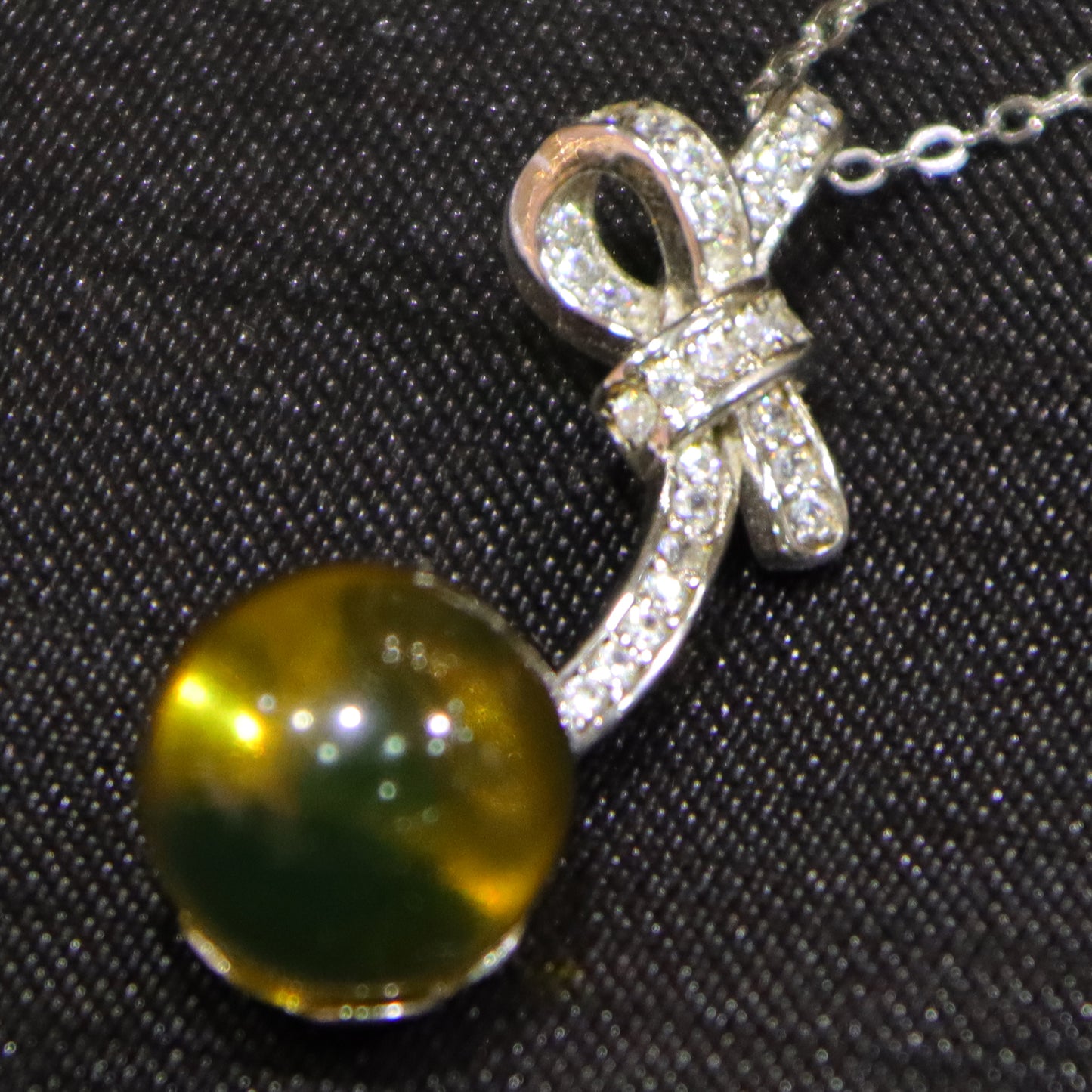 925 Sterling Silver Natural Mexico Blue Amber Bow Pendant with 10mm Bead