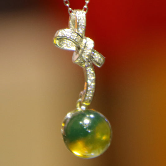 925 Sterling Silver Natural Mexico Blue Amber Bow Pendant with 10mm Bead