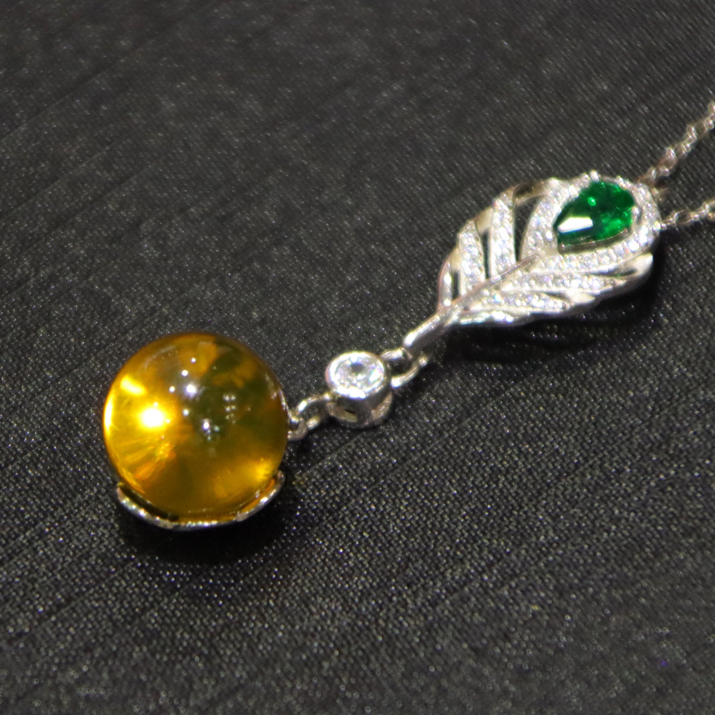 925 Sterling Silver Pendant with Natural Mexico Blue Amber Gemstone and Zircon Green Gemstone Feather Clasp