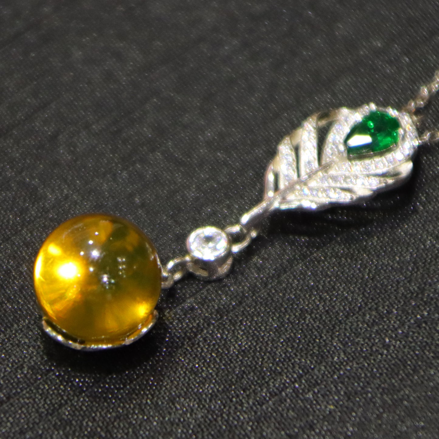 925 Sterling Silver Pendant with Natural Mexico Blue Amber Gemstone and Zircon Green Gemstone Feather Clasp