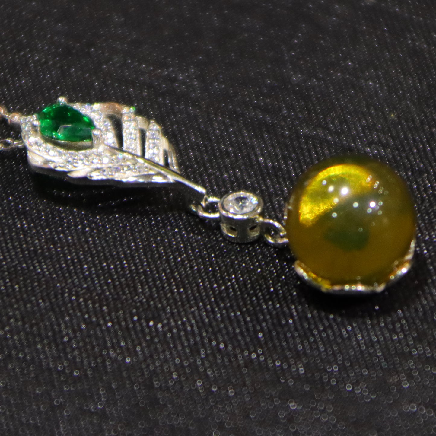 925 Sterling Silver Pendant with Natural Mexico Blue Amber Gemstone and Zircon Green Gemstone Feather Clasp