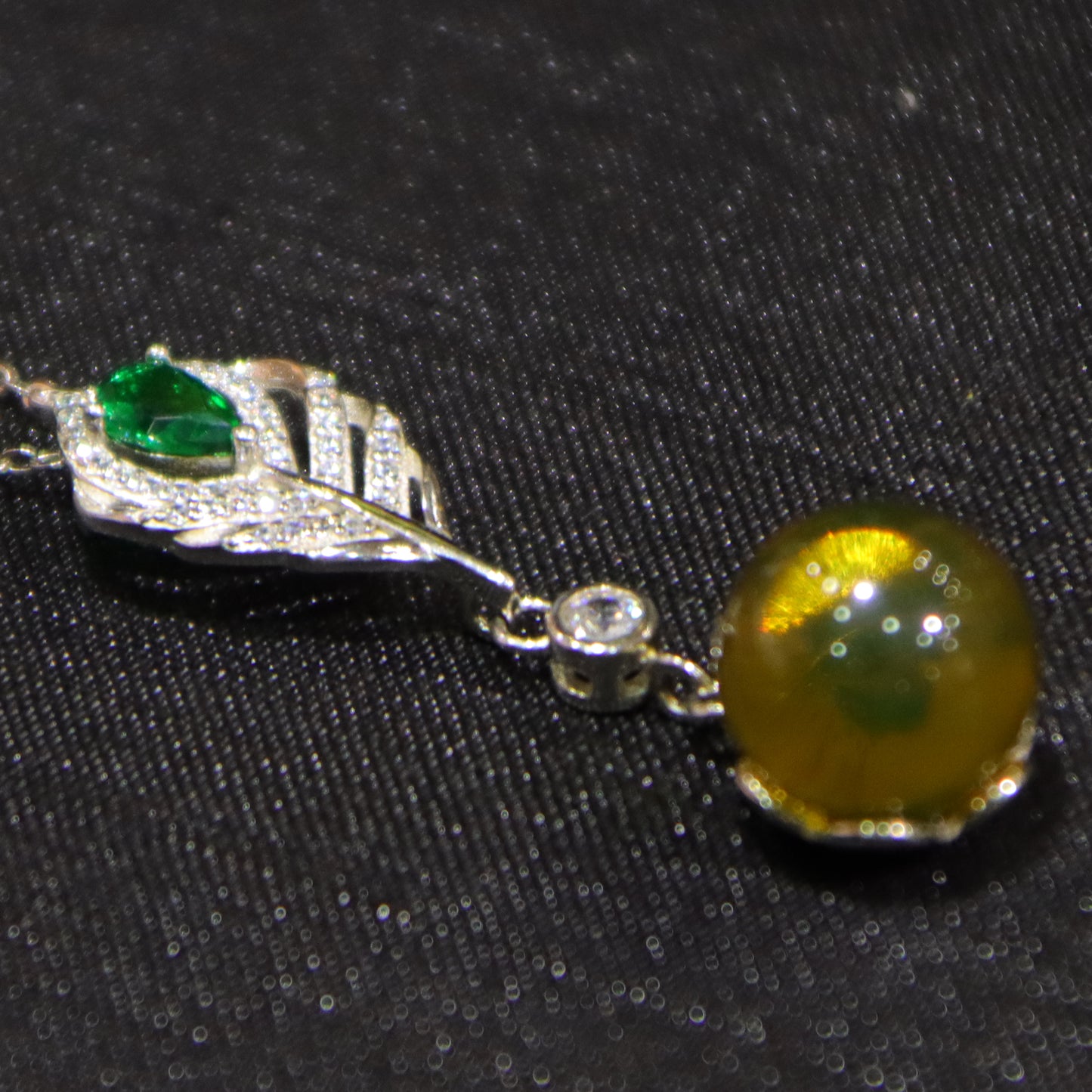 925 Sterling Silver Pendant with Natural Mexico Blue Amber Gemstone and Zircon Green Gemstone Feather Clasp