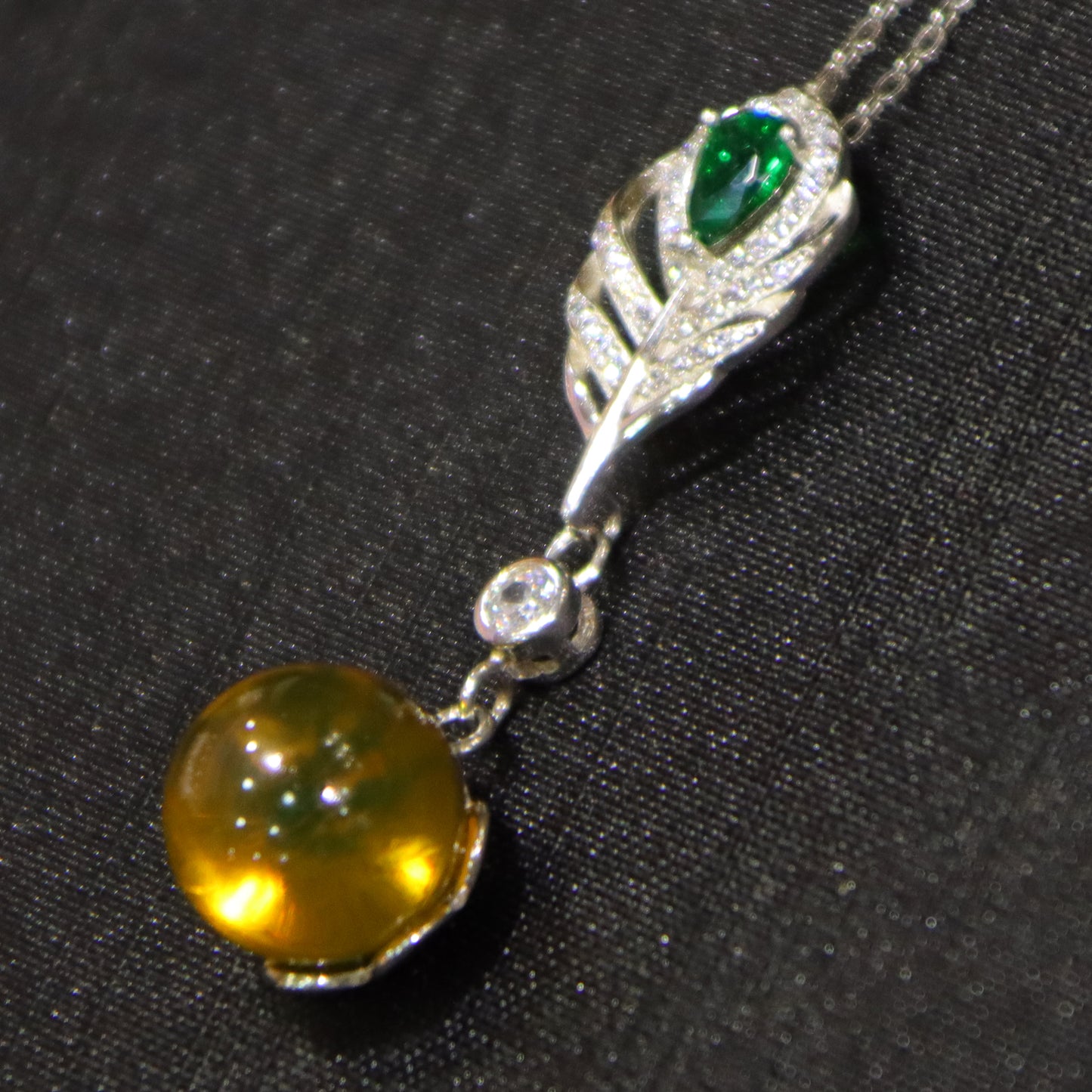 925 Sterling Silver Pendant with Natural Mexico Blue Amber Gemstone and Zircon Green Gemstone Feather Clasp